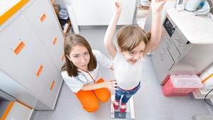 Blog-pediatric-back-girl-nurse-scale-weigh-1_column.jpg