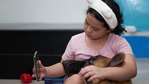 Animal-care-giver_service-dog_with-patient_1col.jpg